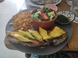 Tofu scramble with delicious pesto, almond cream, and incredible bread at The Vegan Shack in Panama City