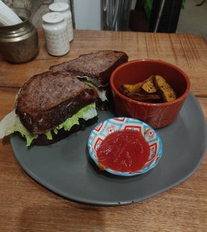 Tofu and BBQ sandwich with papas at The Vegan Shack in Panama City