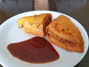 Bread pakora with tamarind based sauce at Om Vegetarian Tarneit in Tarneit