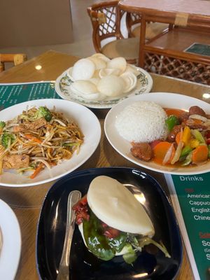 BBQ ‘meat’ bao bun, noodles with tofu and mushrooms, sweet and sour crispy faux chicken with veg and rice, then not prawn crackers. at ZenV Garden  in Gloucester