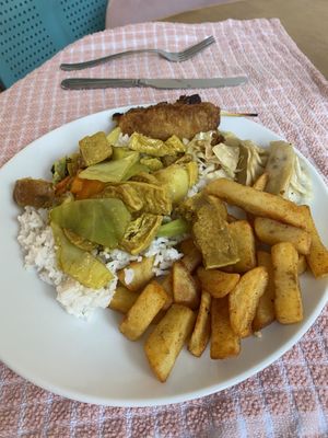 Curry tofu with spring rolls, chips and ficken skewers   at ZenV Garden  in Gloucester