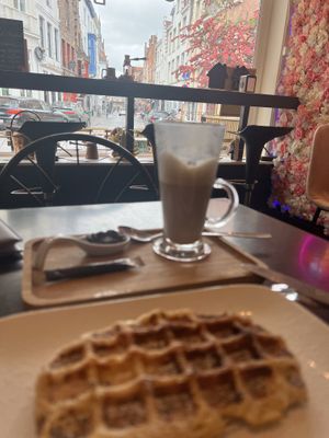 Vegan waffle with oat milk latte. Tell Sam sent you!  at Chocolate Bar Brugge in Bruges