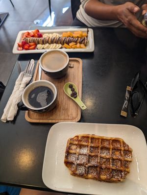 Chocolate and fruit crepes, plain waffles, americano at Chocolate Bar Brugge in Bruges