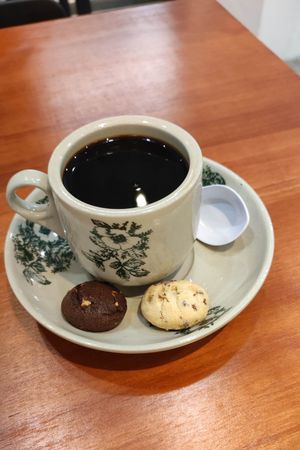 Add on coffee for $1 (some types of free cookies are not vegan) at Little Nonya's Cookies & Cuisine in Central Singapore