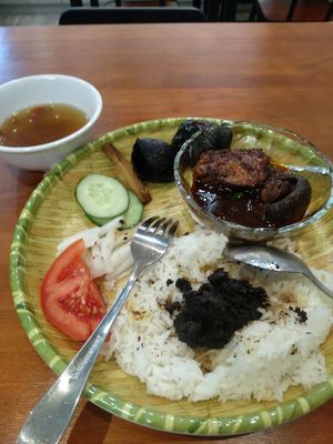 Buah keluak rice at Little Nonya's Cookies & Cuisine in Central Singapore