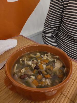 Miso soup with ancient grain pasta and black beans. Served with a lemon drink at Piccola Gastronomia da Elsa in Salerno