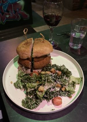 Mushroom burger with onion rings   at Urban Vegan Kitchen in New York City