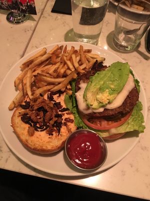 Vegan burger with, avocado and fries. Very delicious  at Urban Vegan Kitchen in New York City