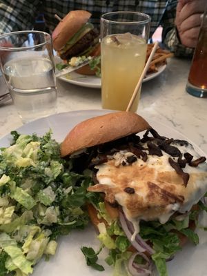 Quarter pound burger with vegan mozzarella and extra shiitake bacon with a ginger ale, super good!  at Urban Vegan Kitchen in New York City