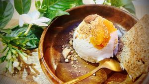 homemade vanilla coconut icre cream topping with homemade pineapple jam and cone so delicious  at Loving Hut Diệp Lâm Vegan in Ho Chi Minh City