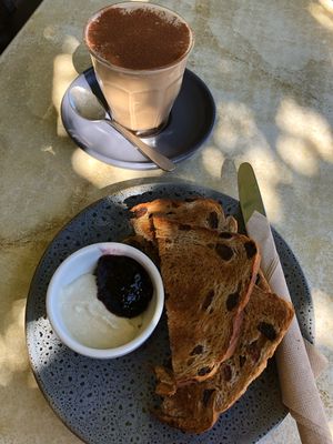 Fruit toast, Jam and nut butter, chai latte  at Red Lime Shack in Port Adelaide