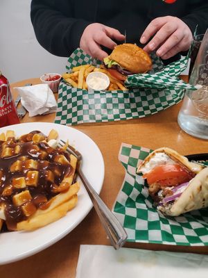 Bakon cheeseburger w/fries, poutine, lamb wrap at Veganarie - Resto Végan in Montreal