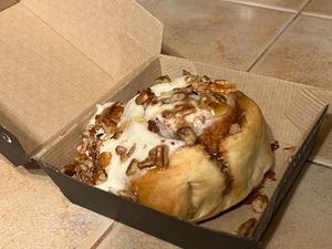 maple frosting with Carmel drizzle and pecans at Cinnaholic in Carmel