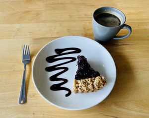 Berries crumble and black coffee  at Real Food 真食 - Orchard in Central Singapore