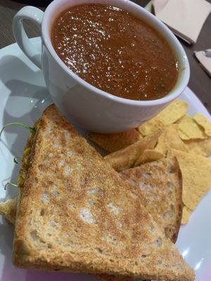 Coronation chickpea toastie, tomato & spinach soup  at This Must Be The Place in Holywood