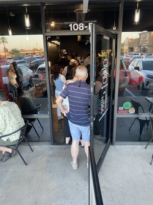 Line out the door at the Yelp Elite event - everyone lining up for the best food in town!  at UNiQ Burger in Scottsdale