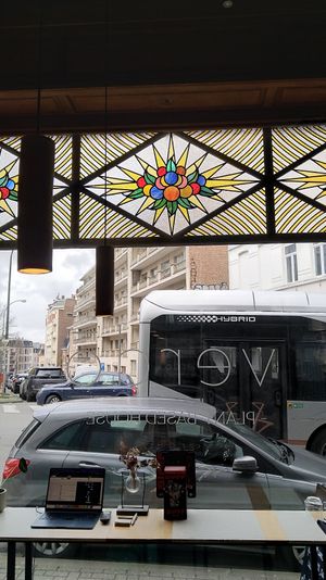beautiful interior with stained glass windows at Verdō in Brussels