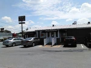 Christopher & Jake's Bistro on Hwy. 53, a very short distance west of I-75 at exit 312, about midway between Atlanta and Chattanooga. They have a full list of vegetarian options, though none labelled vegan. The server said the vegetarian grilled chicken salad is vegan. And they happily substituted cucumbers for cheese on dishes when we asked. The two soups of the day both contained meat when we were there. Their rich homemade dessert selection did not appear to include vegan options. at Christian and Jake's Bistro in Calhoun