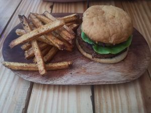 Burger with pineapple at Vegano O No in Panama City