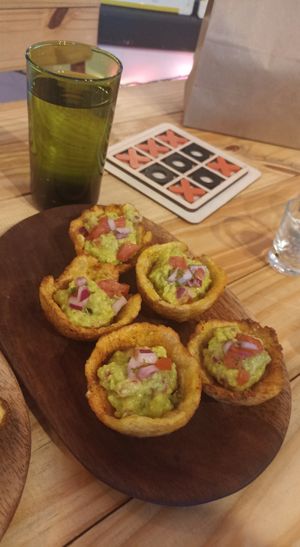 Canastitas de tostones con guacamole: plantain, avocado, tomatoes, red onions at Vegano O No in Panama City