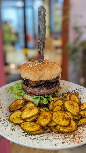 Vegan Latina Burger with chimichurri sauce and sweet riped plantain 🍔 at Vegano O No in Panama City
