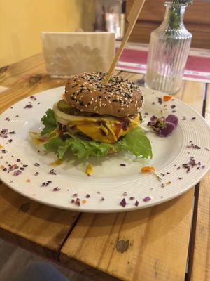 Very tasty vegan burger with melted cheese  at Vegano O No in Panama City