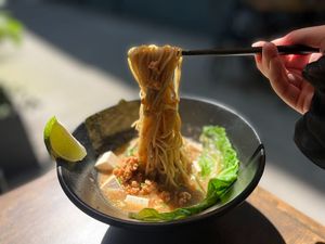 Mapo tofu ramen, warm and slightly spicy. Topped with crispy tofu, fresh green onion and bok choy at Vegan Ramen Mei - Condesa in Mexico City