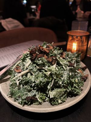 Cesar salad with almond parm on the side   at Planta Queen in Chicago