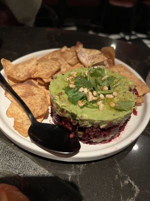 Avocado and beet tartare with taro chips  at Planta Queen in Chicago