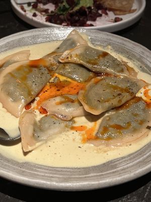 Dumpling of the day: steamed with sweet potato inside and a coconut curry sauce  at Planta Queen in Chicago