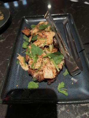Japanese sweet potatoes with kimchi on top—highly recommend!   at Planta Queen in Chicago