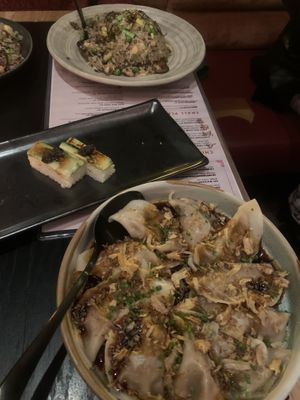 Truffle fried rice, torched and pressed roll, and kimchi dumplings  at Planta Queen in Chicago