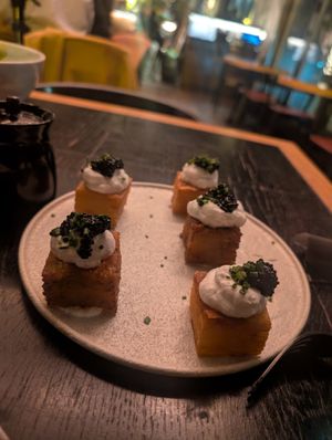 This is the 1,000 layers potato, with vegan cream cheese and caviar (made from seaweed) on top. Was very good at Planta Queen in Chicago