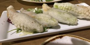 Fried pumpkin flowers stuffed with vegan cheese and olives cream   at Veghometro in Rome