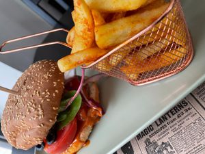 Hamburger with fries at The Den - A plant-based experience in Oeiras