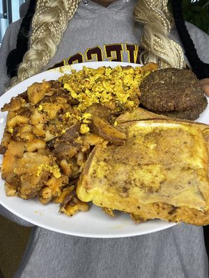 Brunch plate: French toast, potatoes, scrambled tofu, lentil sausage  #Veganuary at Adina's Vegan Cuisine in St Louis