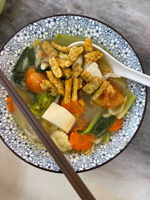Fish head Mee Hoon (but used tempeh instead of mock fish)
 at Botanique Vegetarian Private Kitchen in Petaling Jaya