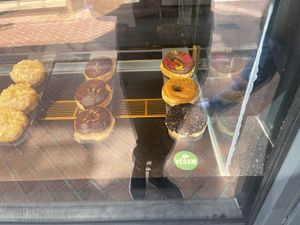 Outside window with labeled donuts   at Offbeat Donut Co in Cork
