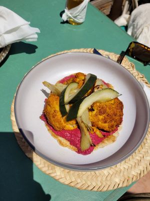 Roasted cauliflower on beetroot hummus with pickles  at Pikala Cafe in Marrakech