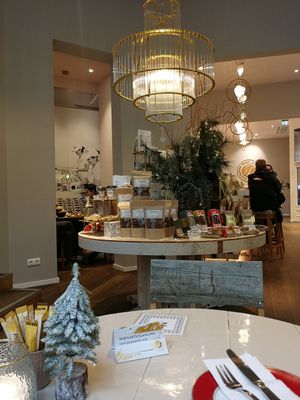 Things to buy, many vegan. There are cards all around saying "be kind, go vegan" (again, not a vegan place) at Isabella Pâtisserie in Munich