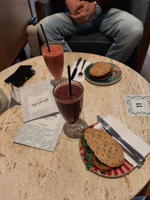 Strawberry smoothie, acai smoothie, avocado sandwich grilled veggie sandwich at Isabella Pâtisserie in Munich