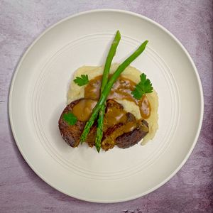 Neatloaf! Impossible & red lentil protein, roasted garlic mash, miso mushrom gravy. at Ghost Vegan in Nashville
