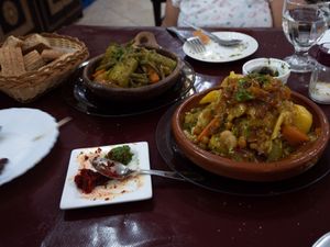 Vegetable tajine, vegetable couscous and spicy sauce at Restaurant Ahlen in Tangier