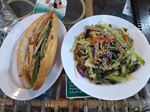 Bahn mi and noodles at Genkan Vegan Cafe in Dong Hoi