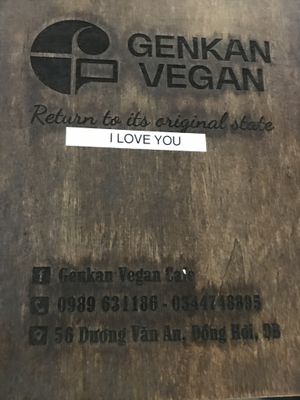 the cover to the menu   at Genkan Vegan Cafe in Dong Hoi