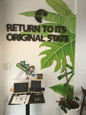 positive messaging on the wall  at Genkan Vegan Cafe in Dong Hoi