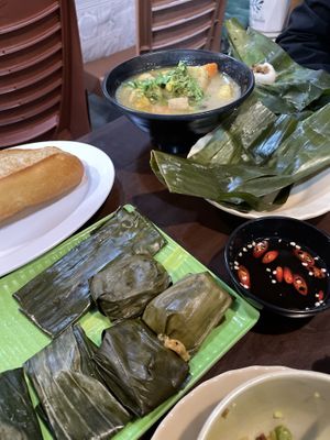 Rice cake leaves and French bread (not vegan) with vegetables  at Genkan Vegan Cafe in Dong Hoi