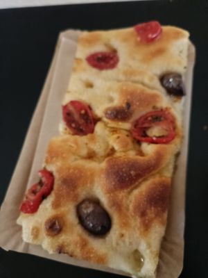 Focaccia with tomato and olive at The Sanctuary in Berlin