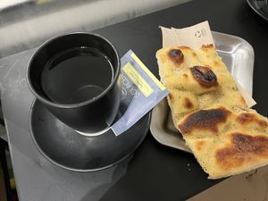 Cheesy-flavored focaccia and tea  at The Sanctuary in Berlin