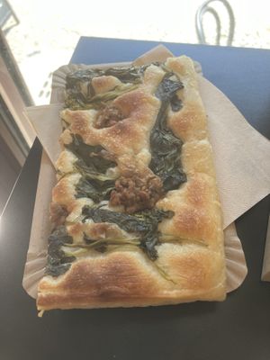 Focaccia with wild broccoli and vegan salsiccia  at The Sanctuary in Berlin